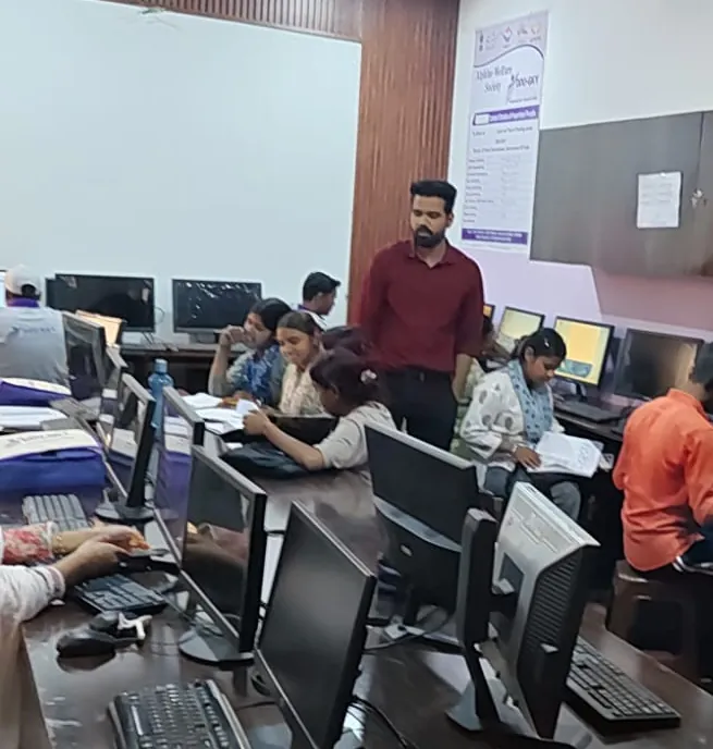 Trainees at computers during a practical session