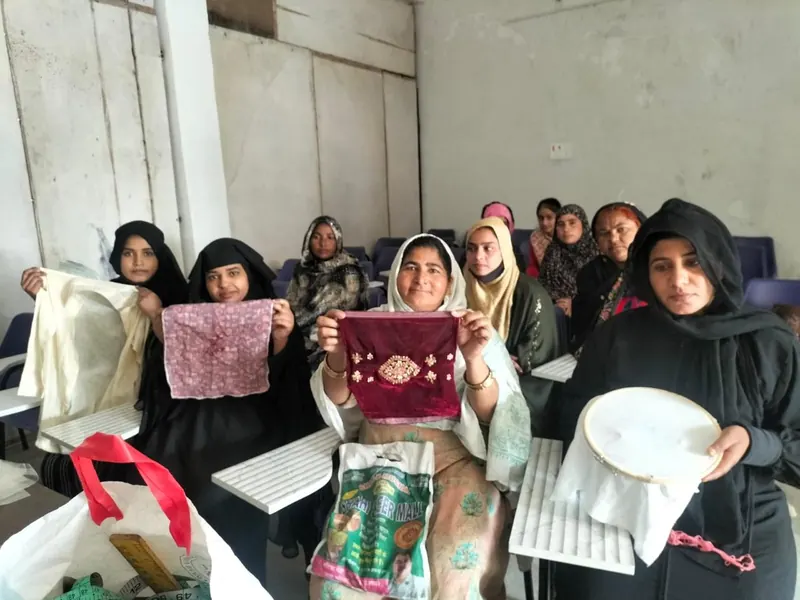 Artisans with their embroidery work